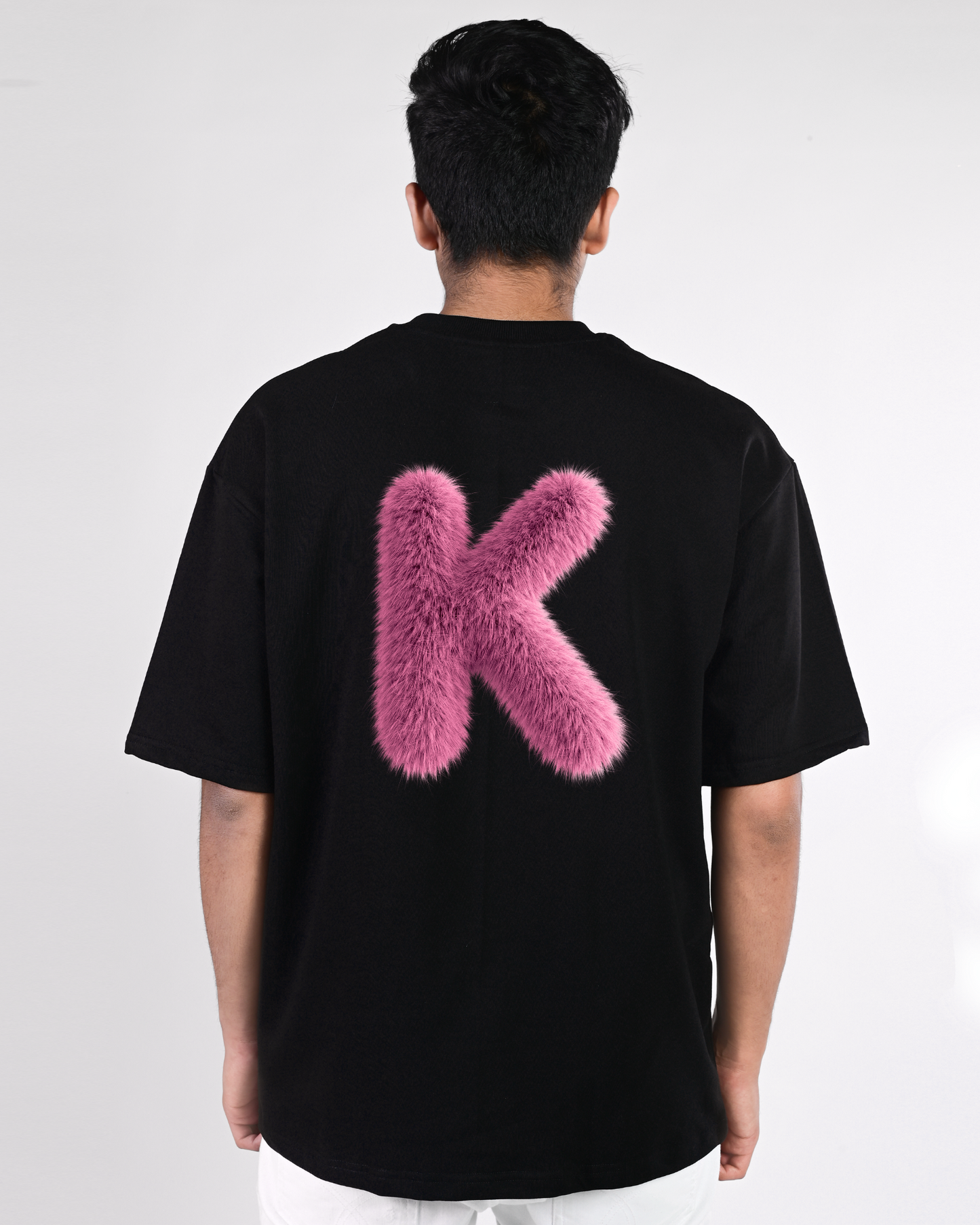 K.